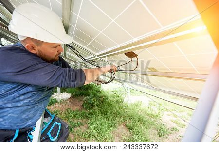 Installing And Wiring Of Stand-alone Solar Photo Voltaic Panel System. Professional Electrician In H