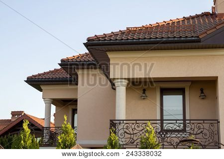 Close Up Of Spacious Brown Shingle Roof Of Modern Luxurious Expensive Residential Cottage House With