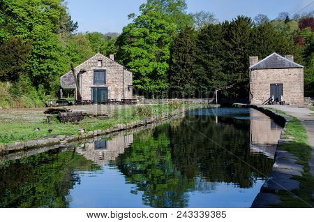Old Buildings At The Side Of Cromford Canal In The Peak District, Derbyshire