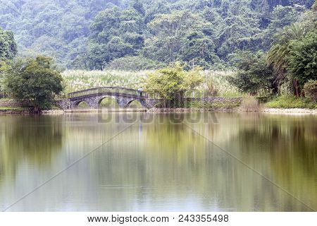 Lake And Bridge In Cuc Phuong Park, Vietnam