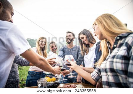Friends Having Dinner In Garden