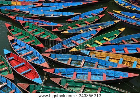 Multi Colored Rowing Boats On Fewa Lake, Pokhara.