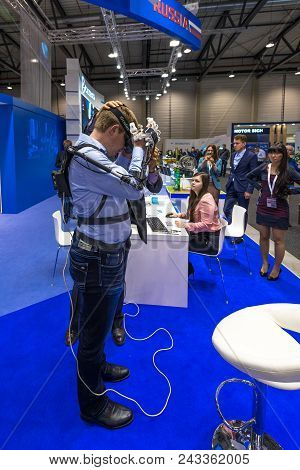 Berlin - April 26, 2018: The Stand Of Roscosmos. Demonstration Of The Operation Of The Hardware-soft