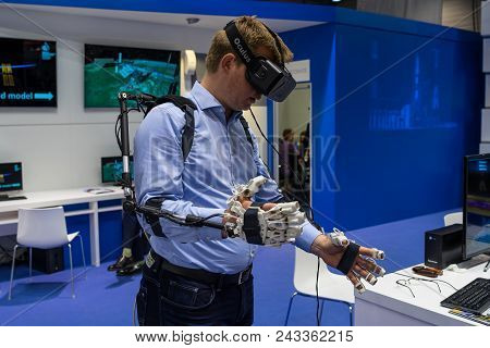 Berlin - April 26, 2018: The Stand Of Roscosmos. Demonstration Of The Operation Of The Hardware-soft