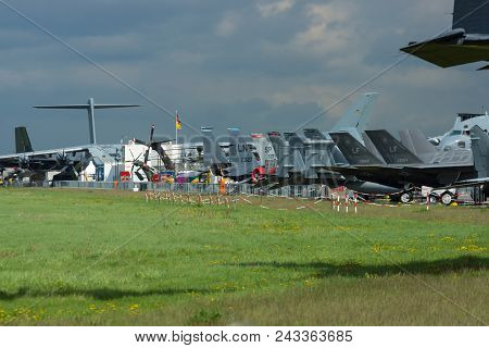 Berlin - April 26, 2018: Various Military Aircraft Stand On The Airfield. Exhibition Ila Berlin Air 