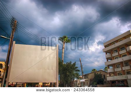 Detail Of Building In Cloudy Sky Landscape