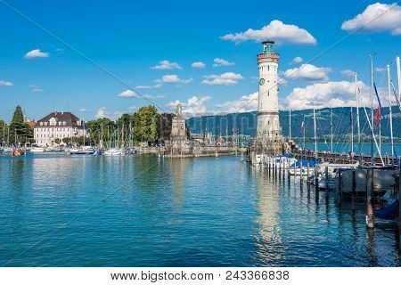 Germany, Lindau - August 21: View Of The Lighthouse And A Lion Statue At The Entrance To The Port Of