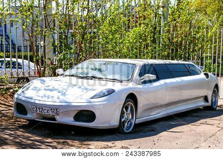 Moscow, Russia - March 3, 2018: White Limousine Ferrari F430 In The City Street.