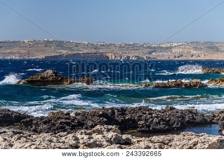 Photo Of Sea Water Beating Against Rock, Cirkewwa, Malta