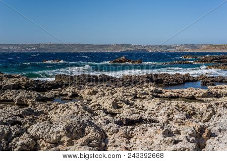 Photo Of Sea Water Beating Against Rock, Cirkewwa, Malta