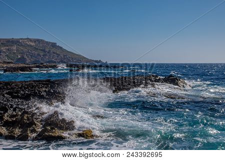 Photo Of Sea Water Beating Against Rock, Cirkewwa, Malta