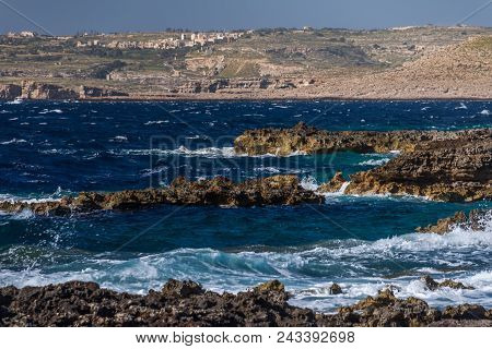 Photo Of Sea Water Beating Against Rock, Cirkewwa, Malta