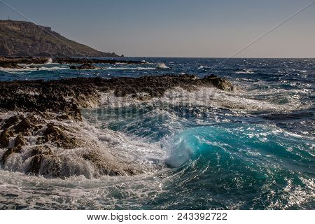 Photo Of Sea Water Beating Against Rock, Cirkewwa, Malta