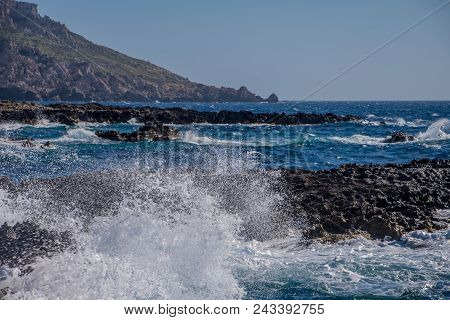 Photo Of Sea Water Beating Against Rock, Cirkewwa, Malta