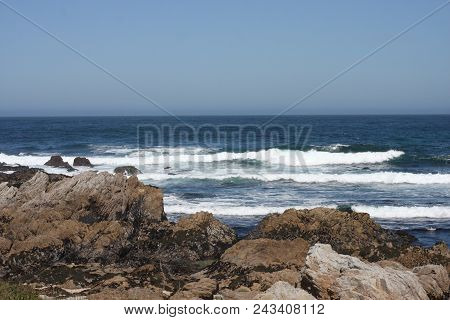 This Is An Image Of The Incoming Tide At Asilomar State Beach
On A Warm Sunny Day In June.