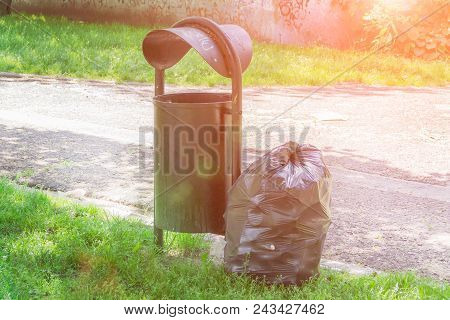 Bag For Garbage. The Garbage Is Filled Inside And Around The Outer Vessel.