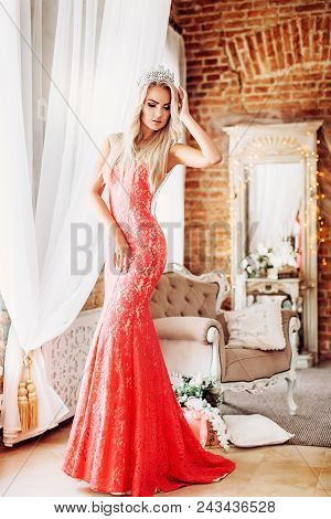 Portrait Of Beautiful Woman With Makeup In Fashion Pink Clothes