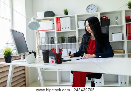 Portrait Of A Young Girl In A Suit. Beautiful Girl Is Working In The Office.
