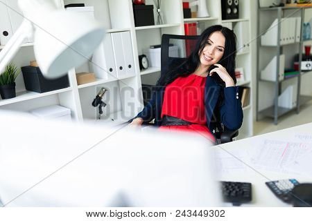 Portrait Of A Young Girl In A Suit. Beautiful Girl Is Working In The Office.