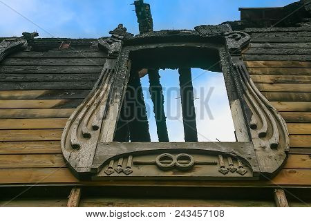 Facade Of The Burned-down Wooden House In Modernist Style