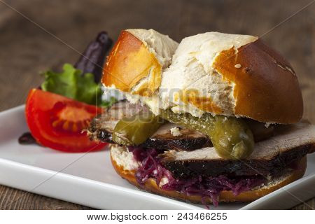 Bavarian Burger With Roasted Pork In Prezel Dough