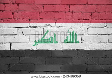 Iraq Flag Is Painted Onto An Old Brick Wall