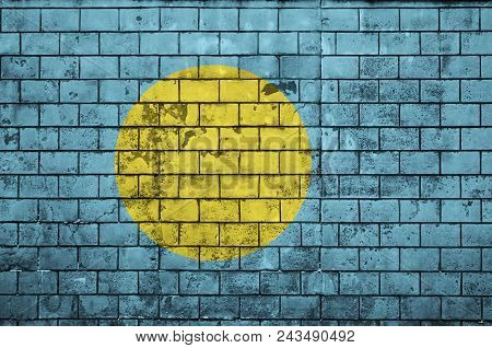 Palau Flag Is Painted Onto An Old Brick Wall