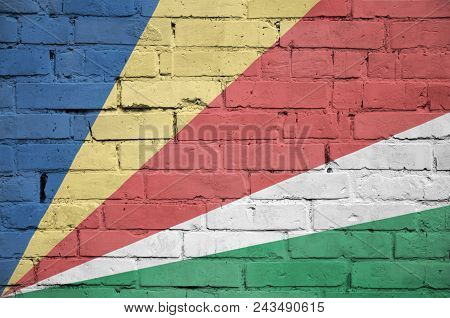 Seychelles Flag Is Painted Onto An Old Brick Wall