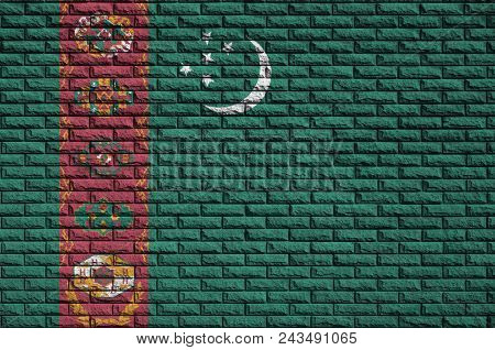 Turkmenistan Flag Is Painted Onto An Old Brick Wall