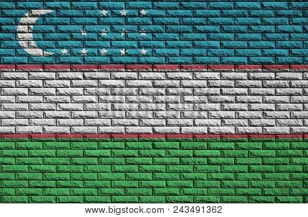 Uzbekistan Flag Is Painted Onto An Old Brick Wall