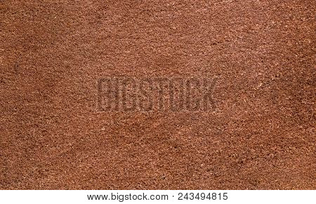 Brown Sandstone Wall Texture Details. Close-up Photo Of Gritty Background. Horizontal Orientation