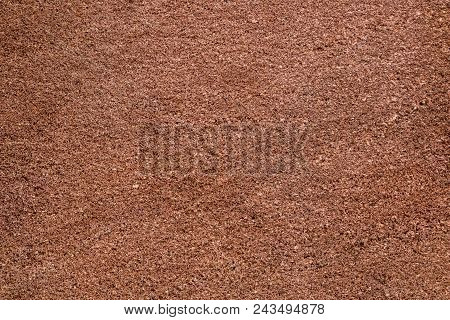 Brown Sandstone Wall Texture Details. Close-up Photo Of Gritty Background. Horizontal Orientation