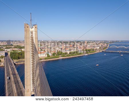 An Aerial View Of The Vansu Bridge Or Suspension Bridge That Spans The River Daugava In The Latvian 