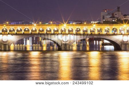The Bridge Bercy At Night, Paris, France. It Is A Vital Artery Between The Two Banks, And Although T