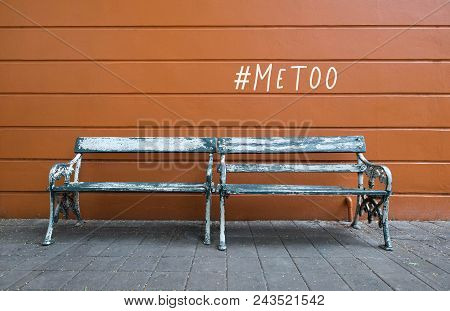 Two Old Wooden Chairs And #metoo Words On The Walls Of The Brown Walls. As Part Of Anti Sexual Haras