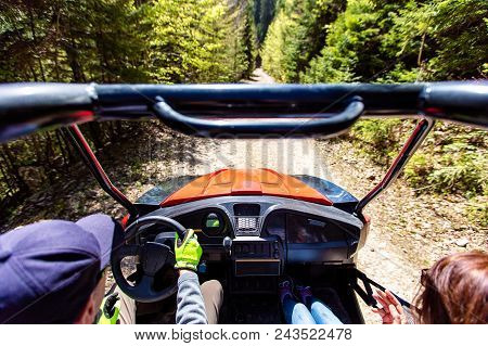 Young People On Utv Vehicles On A Countryside Trail. View From A Utv Vehicle With Man Driving An Utv