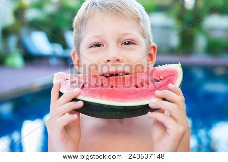Funny Toothless Handsome Boy Eating Slice Water Melon Near Swimming Pool Holiday Time Close Up Summe