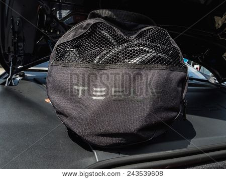 Urmond, Netherlands - May 31, 2018. Original Set Of Chargers In The Tesla Bag. Charging Cable For El