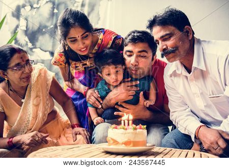Indian family celebrating a birthday party