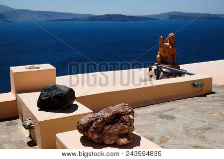 Typical Mediterranean Urban City And Sea Landscape Seen From A Terrace. Santorini Greece