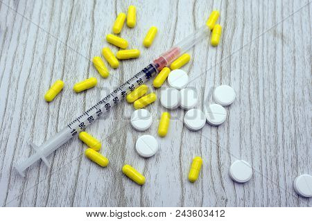 Medical Ampoules Isolated Syringe With Medicine Vials And A Syringe Ready For Injection Copy Space