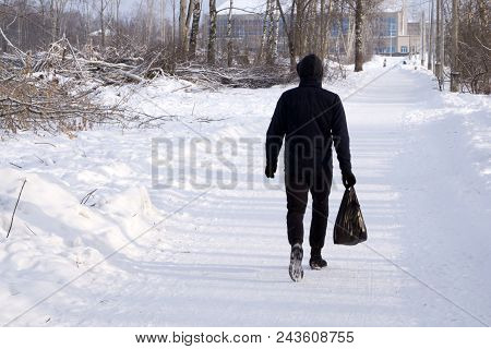 Happy Man In Winter Jacket Comes With Purchases From The Shop