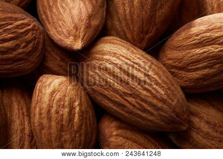 Organic texture of almonds. View from above