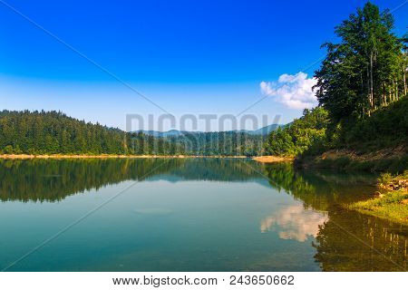 Beautiful Mountain Landscape In Croatia, Lokvarsko Lake With Risnjak Mountain In Background, Reflect