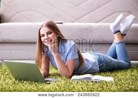 Young female student preparing for college exams