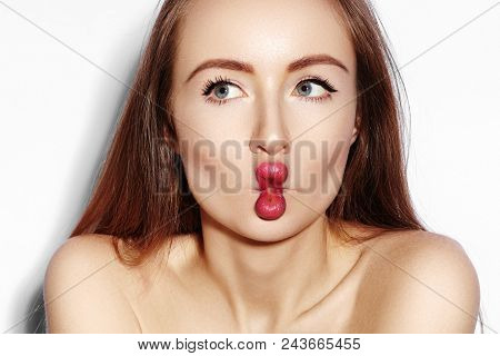 Funny Fish Lips Face With Exprissive Emotions. Beautiful Model Girl With Makeup, Red Lip, Perfect Sk