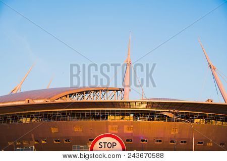 A Stop Sign On The Background Of The Stadium Zenith-arena, Close-up In The Rays Of The Sunset, The W