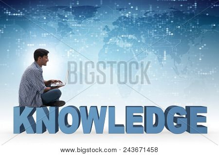 Young man in telelearning concept with laptop and books