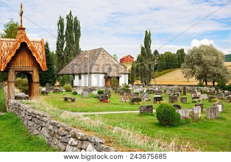 Heddal, Norway-august 15, 2014 -  Old Cemetery In Norwegian Village Near The Old Church.