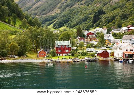 Undredal, Norway-august 16, 2014 -  Tourists And Local People At Undredal Village Port.